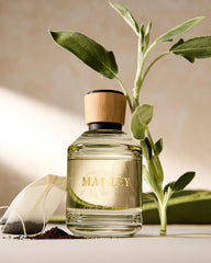 Michael Malul Marley Place of Peace spray mist, illustrating easy application and diffusion.