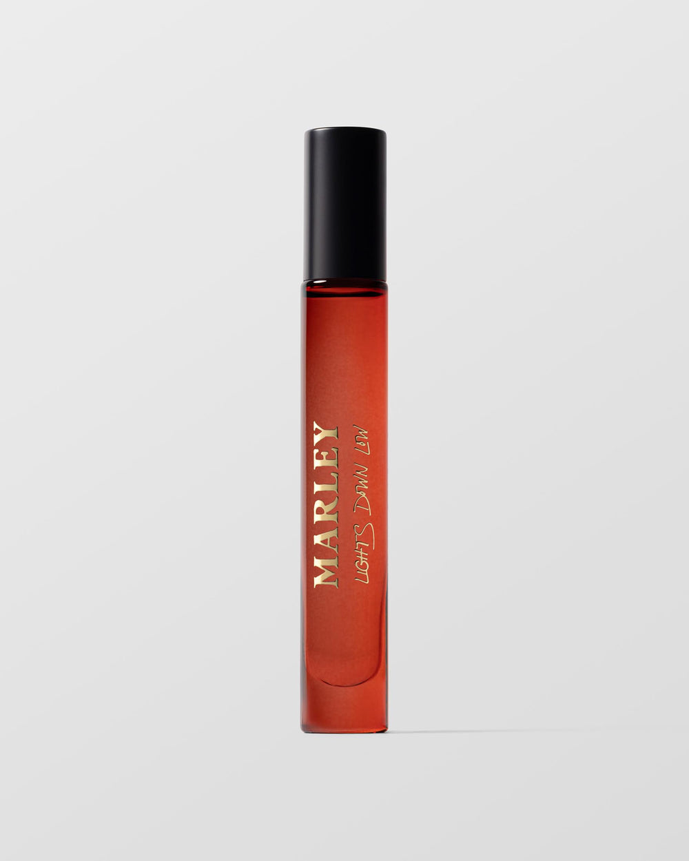 Michael Malul Marley Lights Down Low travel bottle for evening allure.
