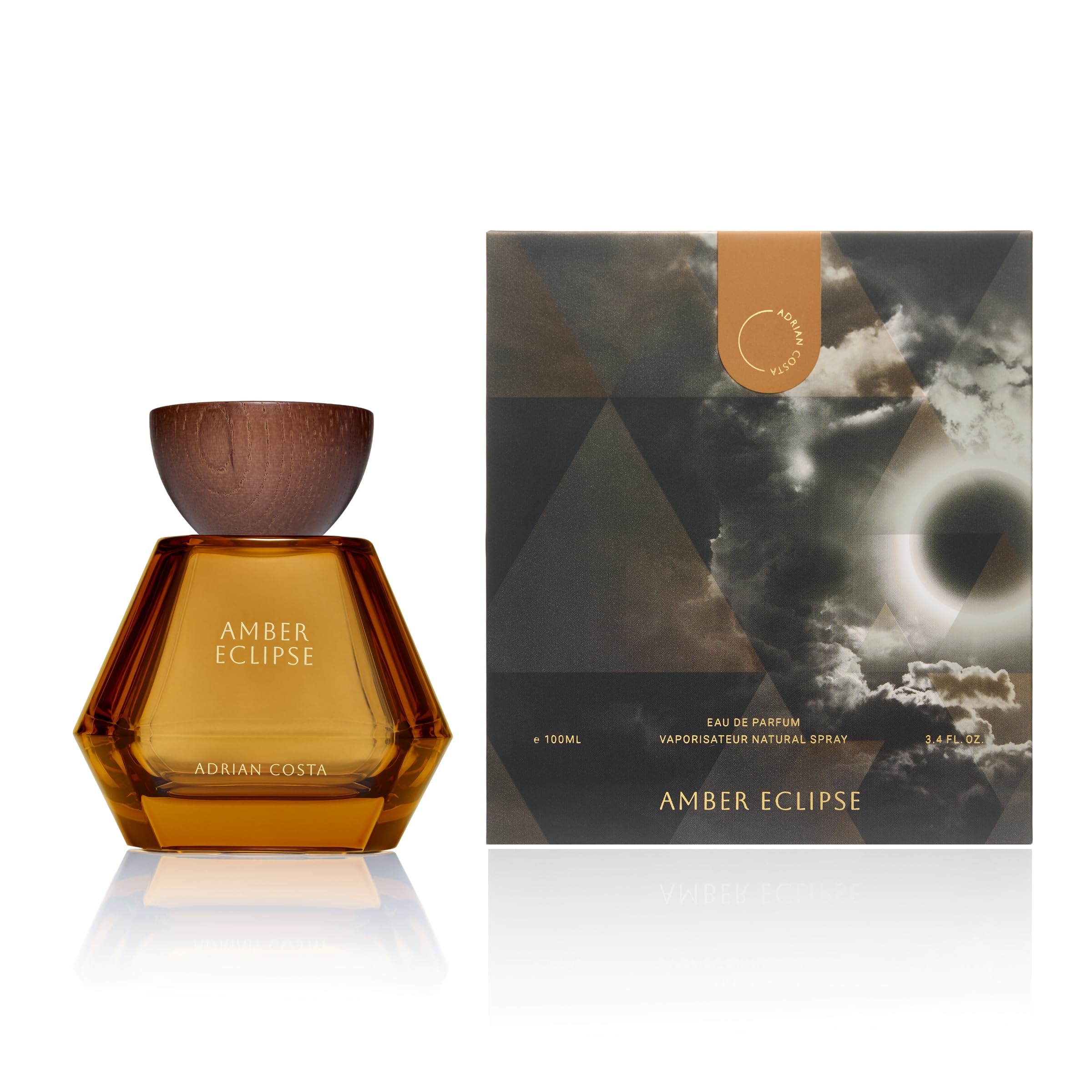 Michael Malul Adrian Costa Amber Eclipse bottle closeup highlighting textured glass and amber tone for gifting.