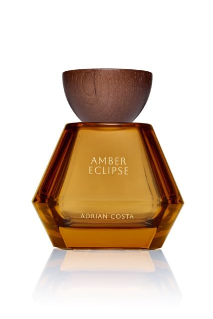 Michael Malul Adrian Costa Amber Eclipse bottle front shows bold masculine presence for evening wear.