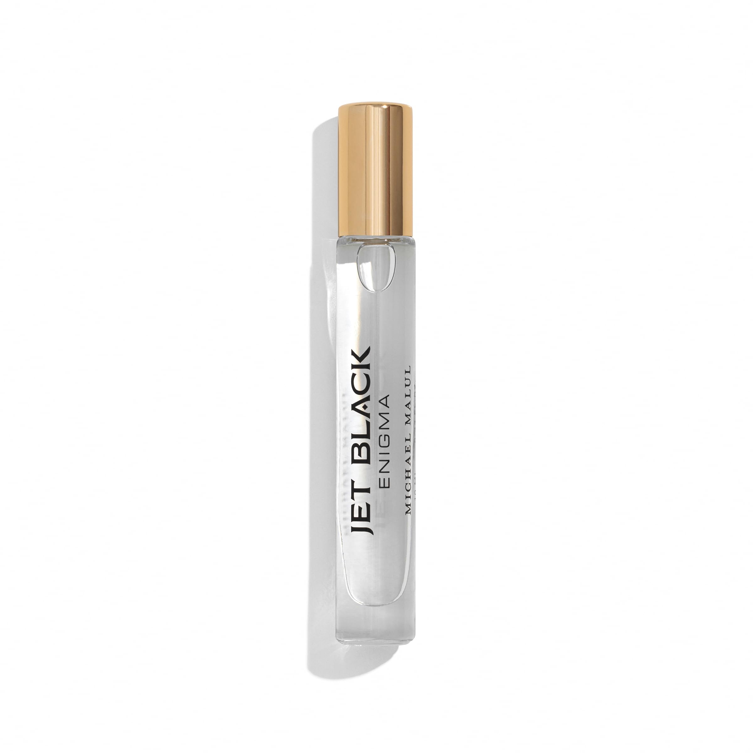 Michael Malul Jet Black Enigma top-notes closeup, highlighting ginger and cardamom for a spicy opening.