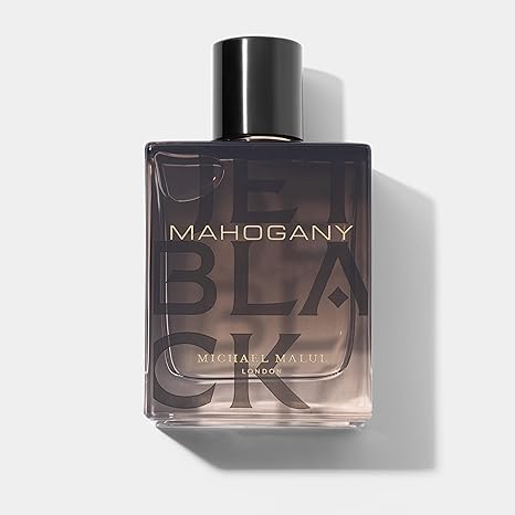 Michael Malul Jet Black Mahogany bottle, sleek focal point for refined daily scent.