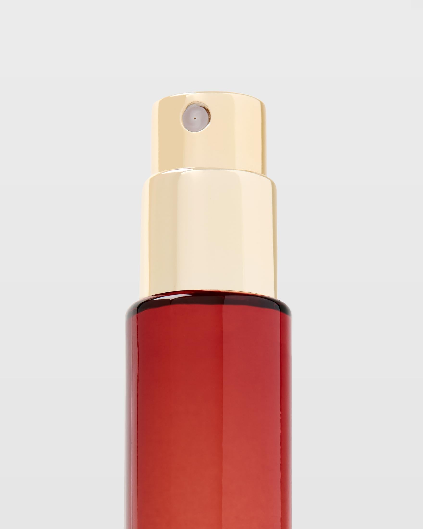 Michael Malul Lights Down Low packaging display, evokes mood-enhancing scent moments.