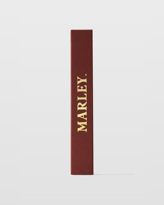 Michael Malul Lights Down Low travel-size bottle, ideal for on-the-go fragrance touch-ups.