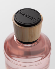 Michael Malul Marley Satisfy My Soul bottle closeup highlighting warm notes for date nights