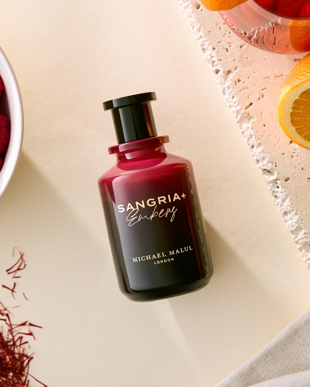 Michael Malul Sangria+Embers cap detail suggests refined, long-lasting fragrance experience