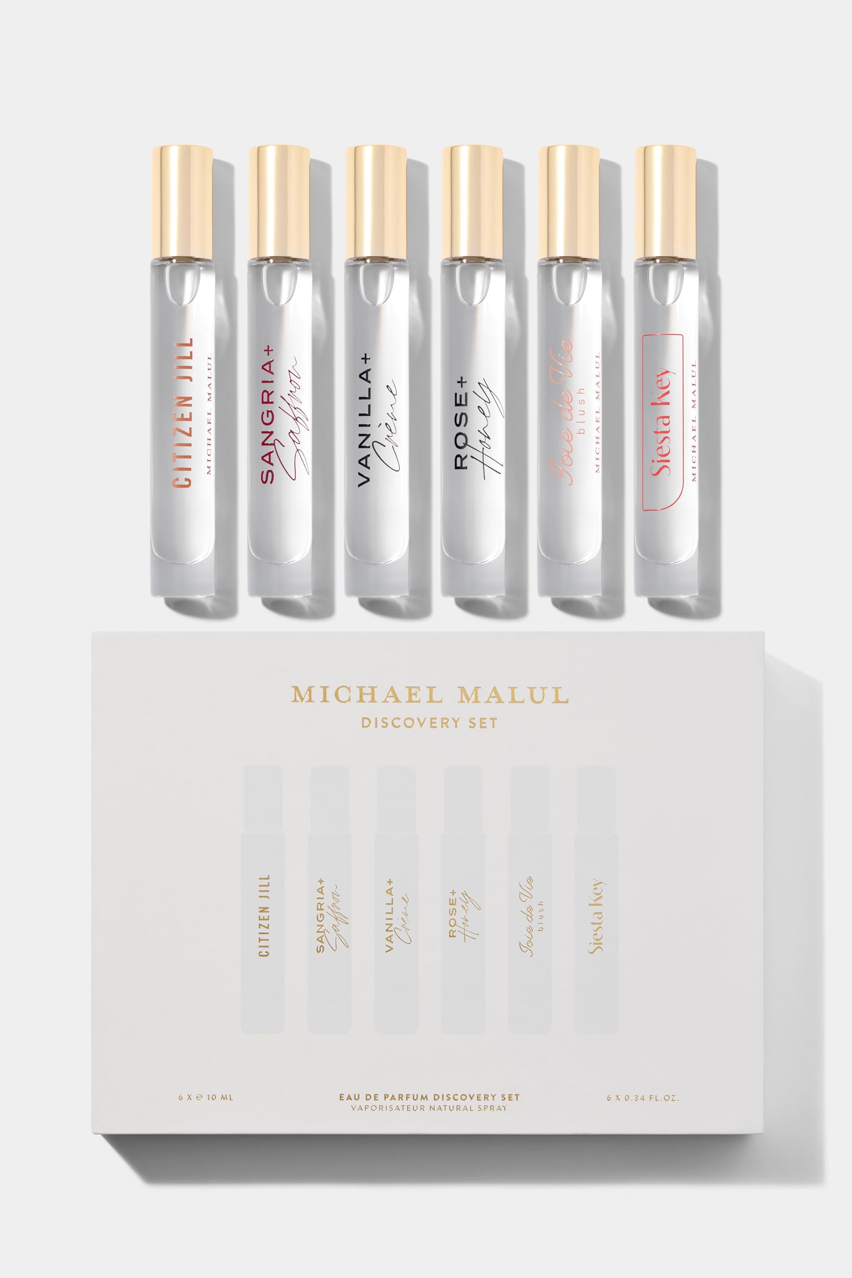 Michael Malul Women's Discovery Set travel-size fragrance bottles for on-the-go exploration.