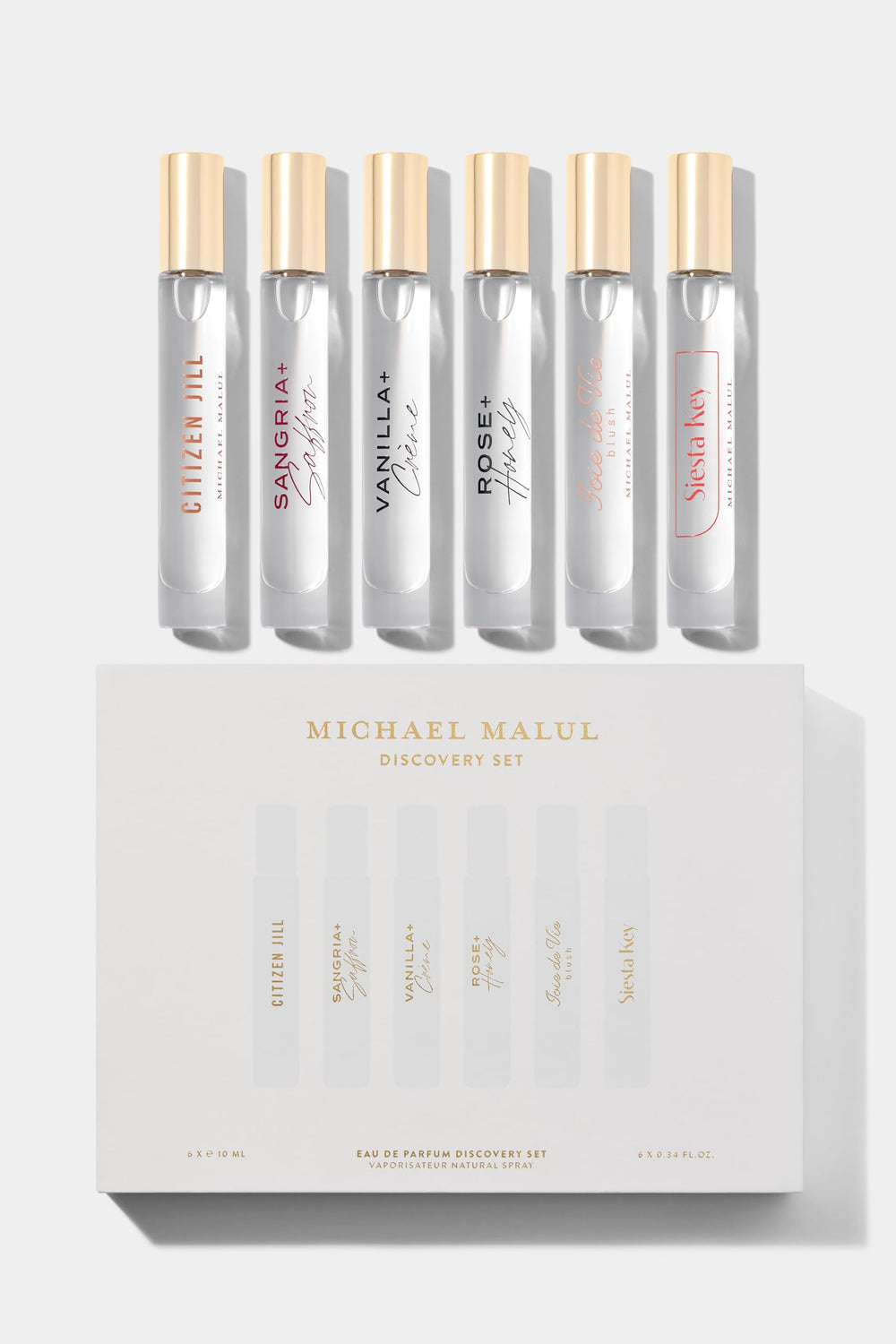 Michael Malul Women's Discovery Set travel-size fragrance bottles for on-the-go exploration.