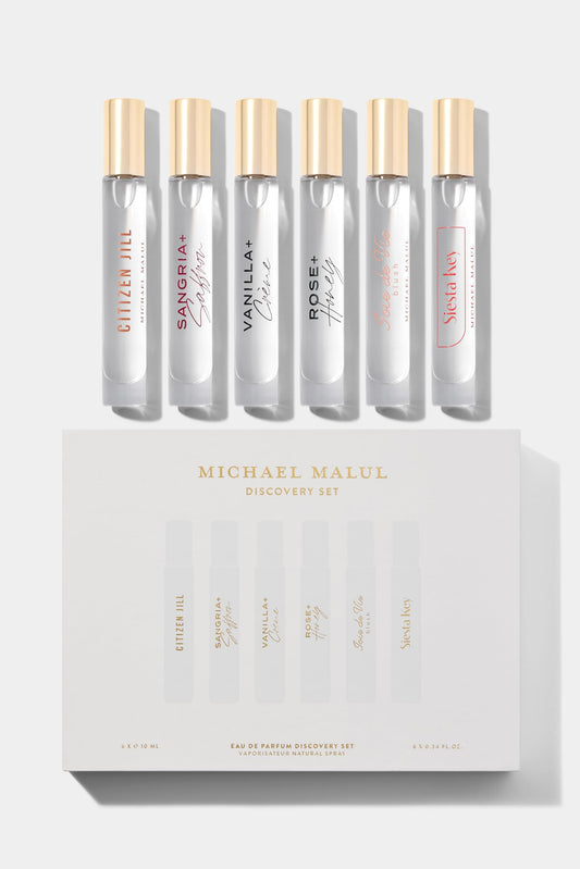 Michael Malul Women's Discovery Set travel-size fragrance bottles for on-the-go exploration.