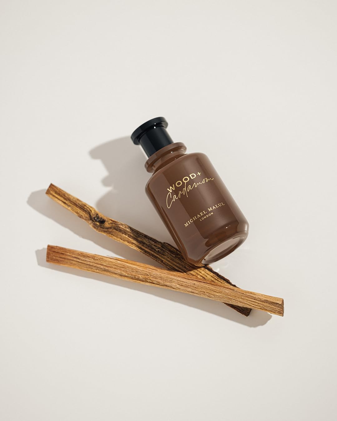 Compact travel-case for Michael Malul Wood + Cardamom.