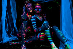Midnight Glo orange UV neon paint ideal for rave body art under blacklight.