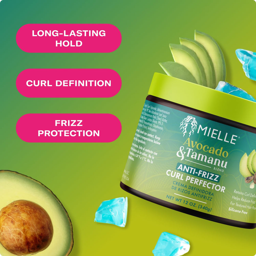 Applying Mielle Avocado & Tamanu on damp hair for curl definition.