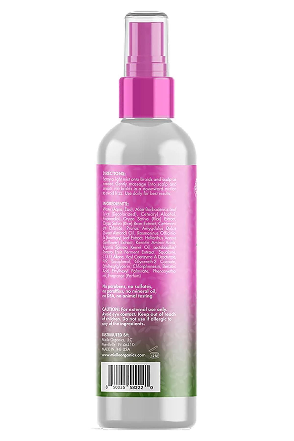 Close-up of Mielle Rice Water & Aloe bottle showing lightweight hydration for braids.