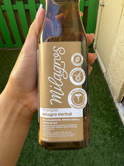 Milagros Rosemary Shampoo on hair during towel drying for a clean feel
