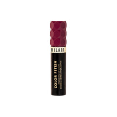 Milani Color Fetish Lip Stain 160 Bitten Berry arm swatch reveals berry shade payoff.