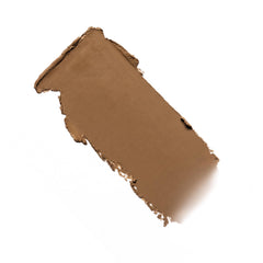 Milani Conceal + Perfect Skin Tint Stick swirl on skin demonstrates buildable coverage.