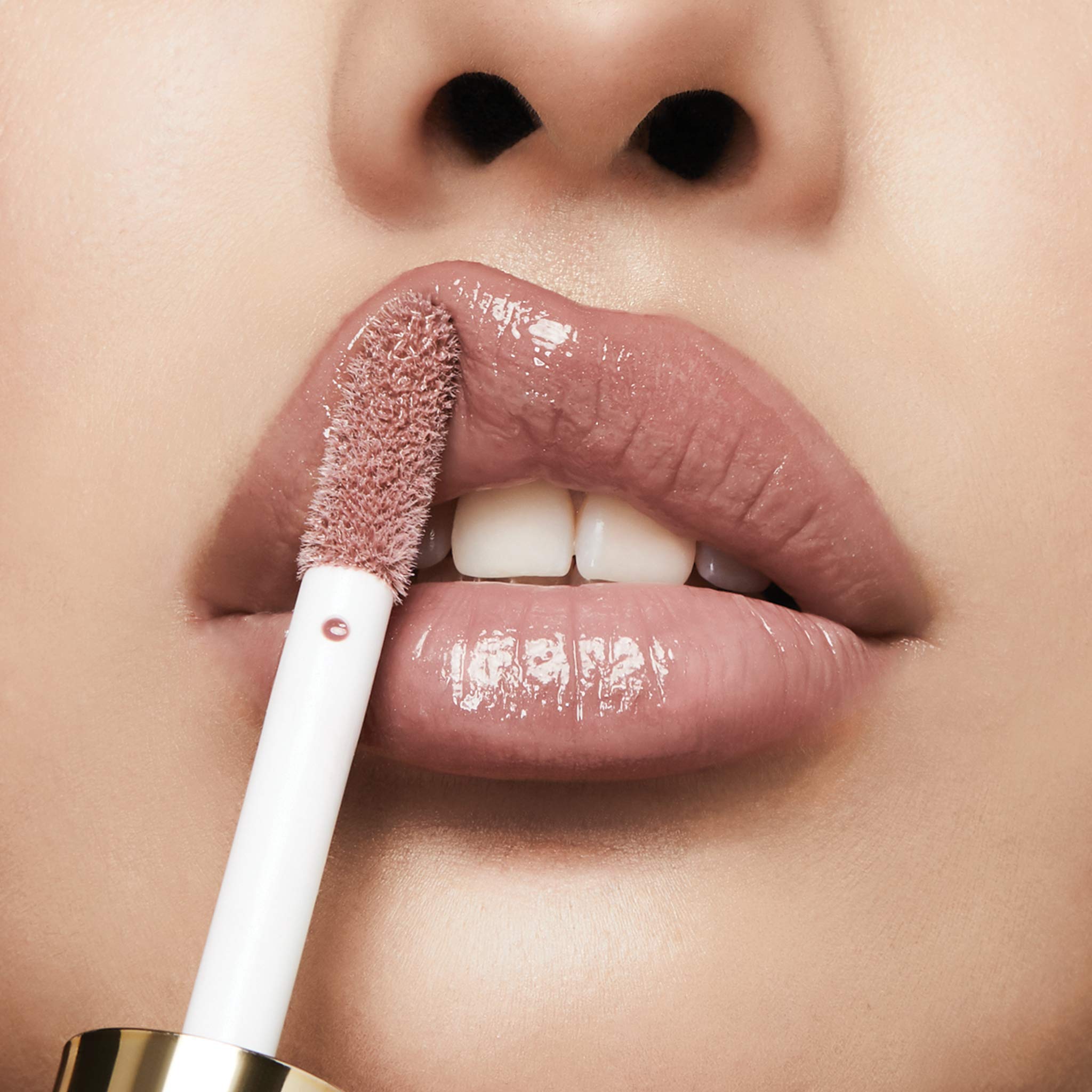 Close-up of lips wearing Soft Rose shade for reference.