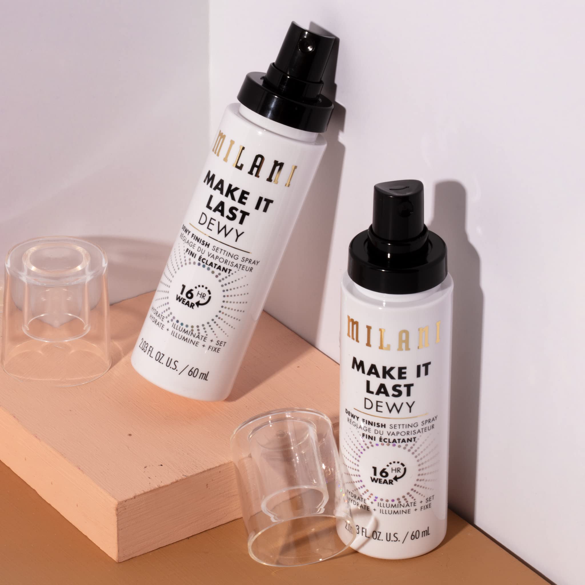 Milani Make It Dewy mist being applied for a dewy, refreshed look.