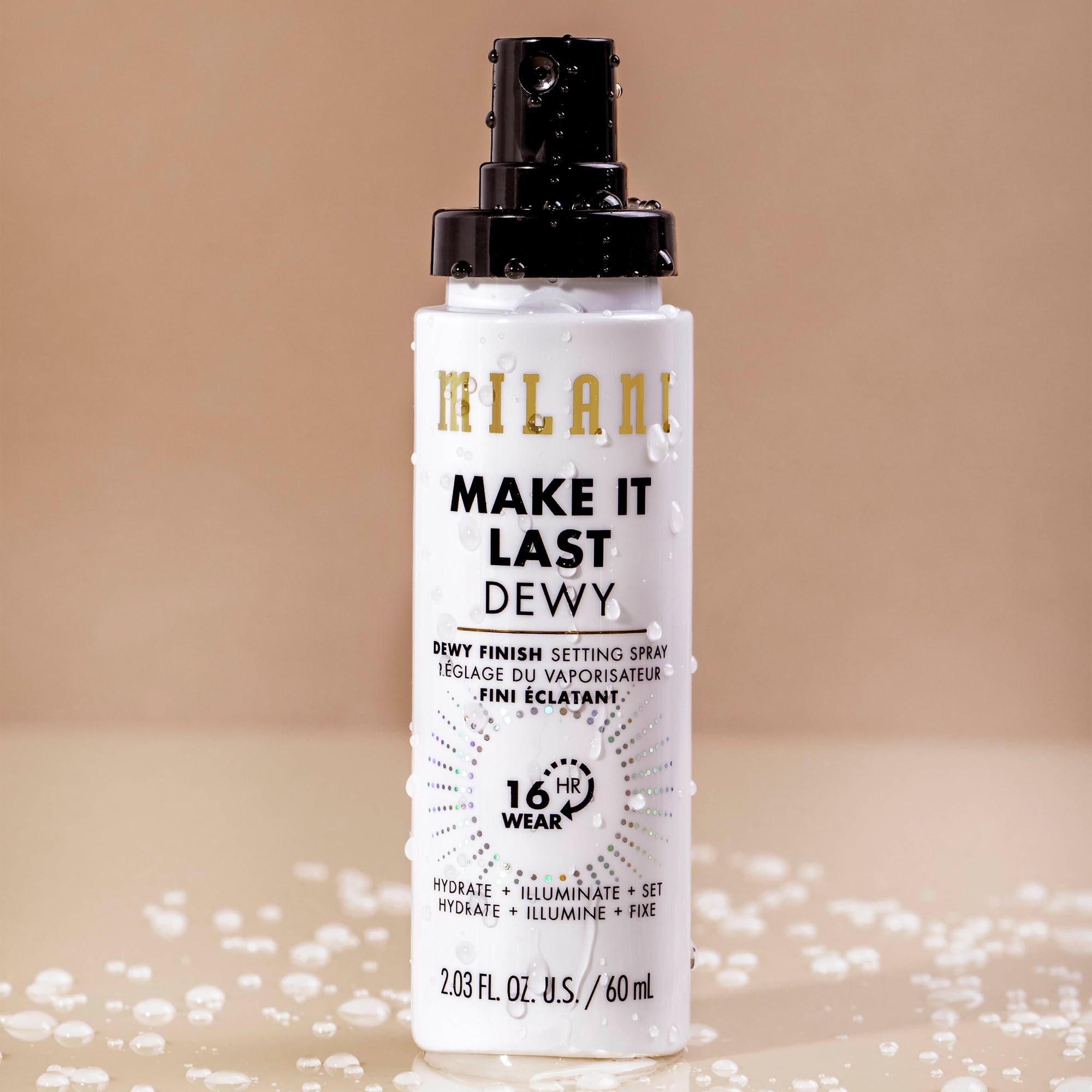 Milani Make It Dewy setting spray applied to lock in makeup.