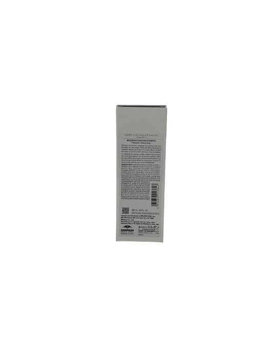 Milbon Moisture Replenishing Treatment application scene highlights smoothing and detangling benefits.