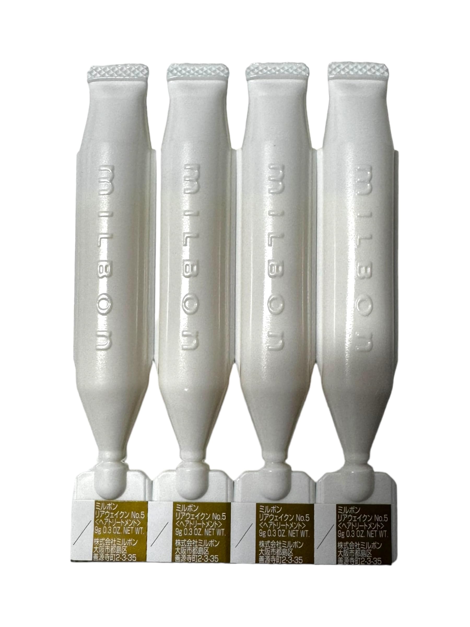 Close-up of Milbon No. 5 Reawaken label highlighting color-safe formula.