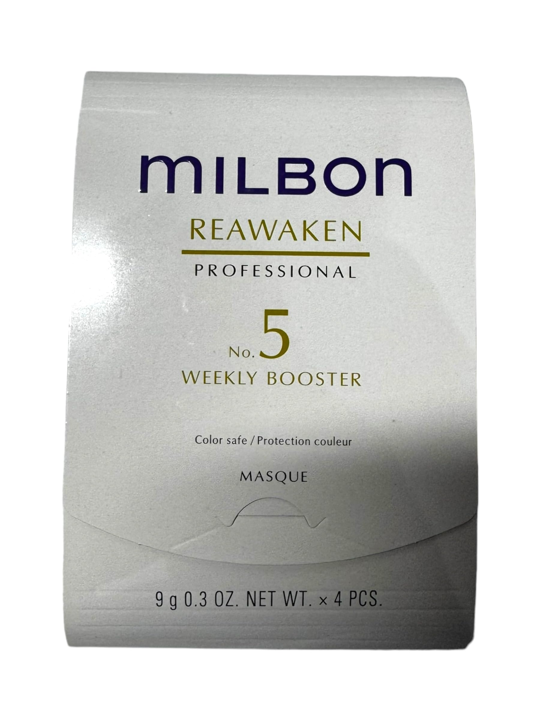 Milbon No. 5 Reawaken bottle pour showing moisturizing booster for dry, aging hair.