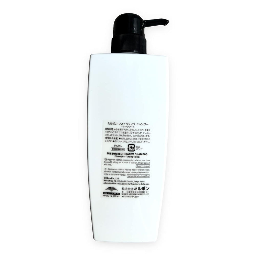 Milbon Repair Restorative Shampoo foaming lather indicating gentle cleansing.