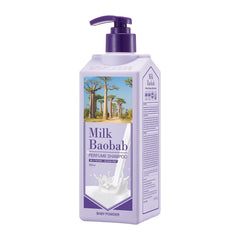 Milk Baobab Official Perfume Shampoo bottle close-up shows baby powder scent that lasts.