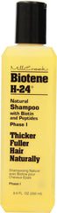 Mill Creek Biotene H-24 Shampoo label closeup, featuring biotin and keratin benefits for hair health.
