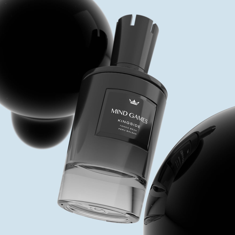 MIND GAMES Kingside amber and woody dry-down supports versatile day-to-night use.