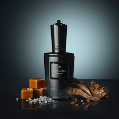 MIND GAMES Mentor middle notes image spotlights amber coffee and cassis for a confident aura