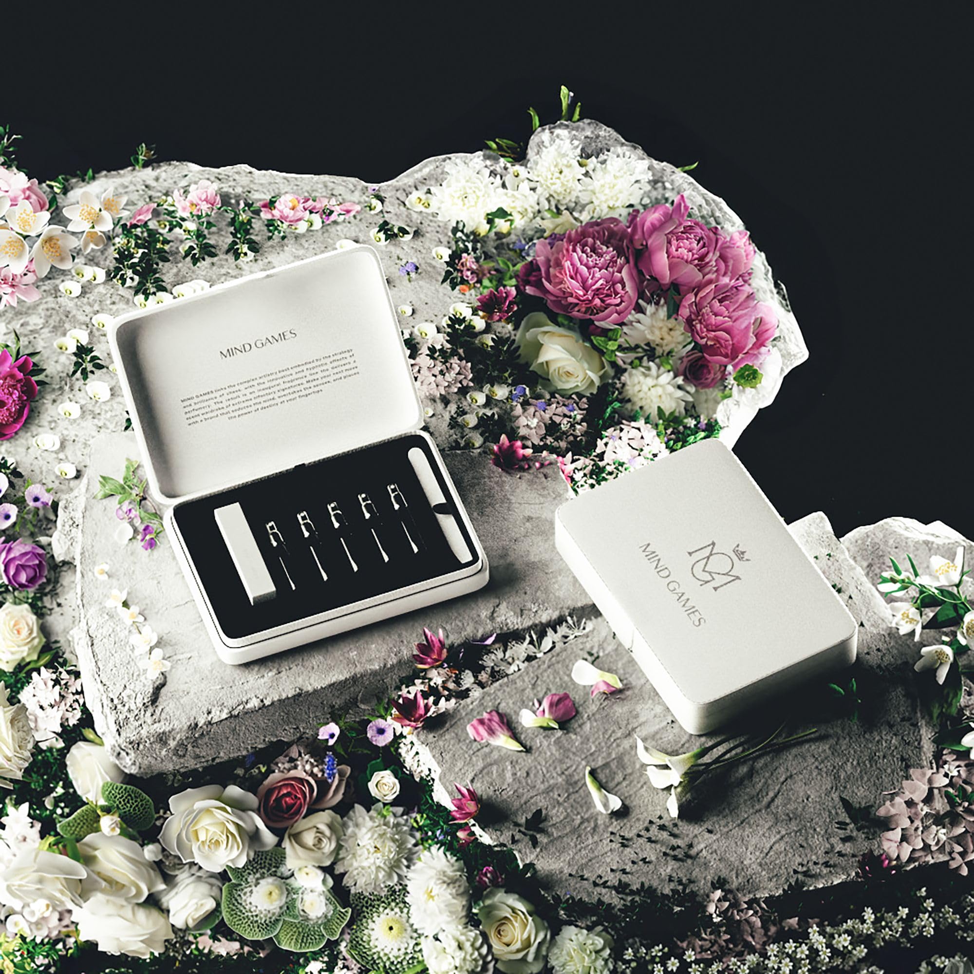 Mind Games reusable travel case protecting fragrances in durable packaging.