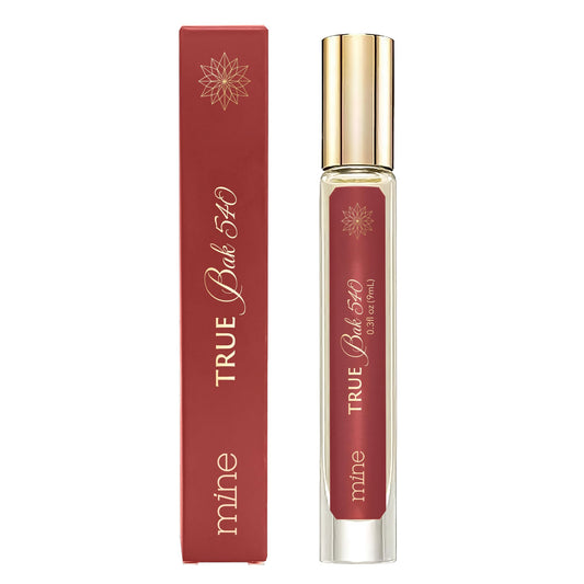 Mine True Bak 540 amber-saffron bottle with warm, translucent allure.
