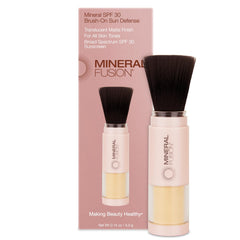 Mineral Fusion Brush-On Sun Defense SPF 30 applying for a shine-free, UV-protective finish.