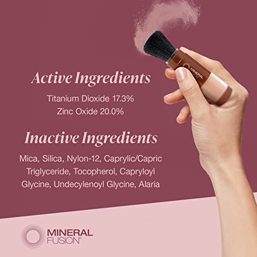 Mineral Fusion mineral sunscreen powder with built-in soft brush for easy, on-the-go application.