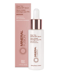 Mineral Fusion Sheer Tint SPF Face Serum bottle demonstrates lightweight sun protection.