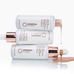 Mineral Fusion sun protection tint on skin for balanced glow.