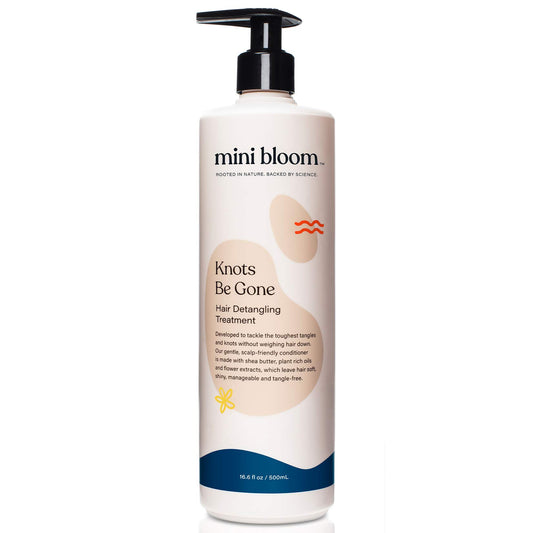 Mini Bloom Knots Be Gone bottle pour for easy detangling during bath time