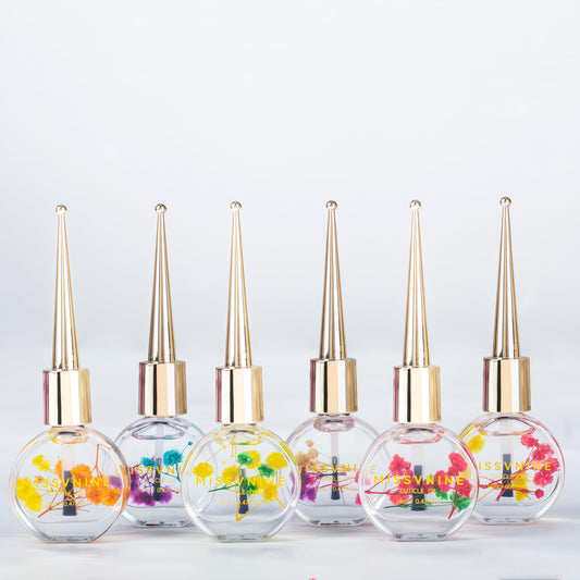 MISSVNINE Vitamin E enriched cuticle oil 6-pack bottle close-up for hydrated cuticles.