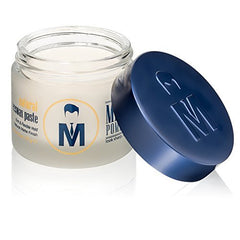 Mister Pompadour paste applied to damp hair for flexible styling.