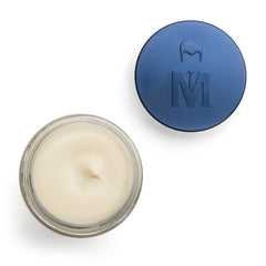 Mister Pompadour natural beeswax paste on hair being styled for strong hold.