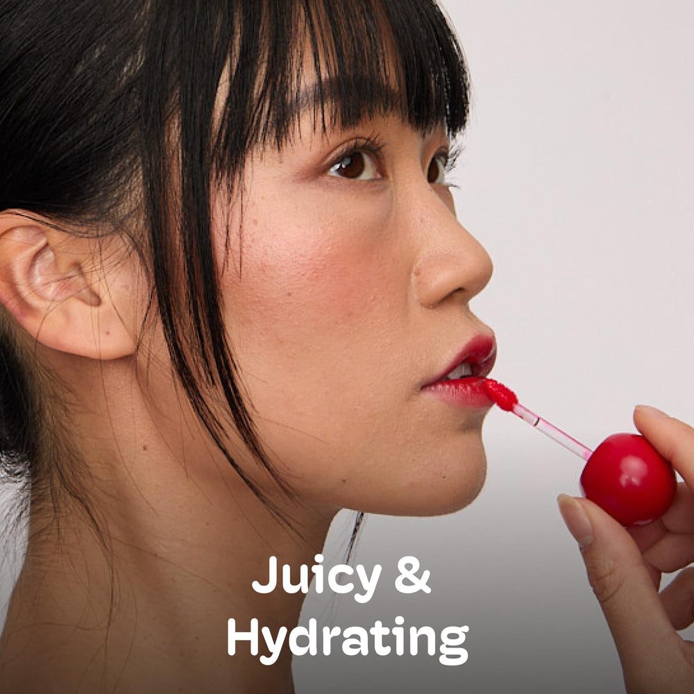 Mixik Juicy Lip Tint on cheeks provides a luminous blush look.