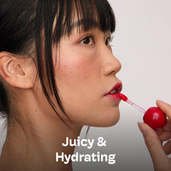 Mixik Juicy Lip Tint on cheeks provides a luminous blush look.