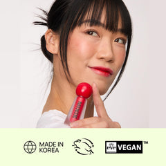 Mixik Juicy Lip Tint packaging close-up emphasizes premium design.