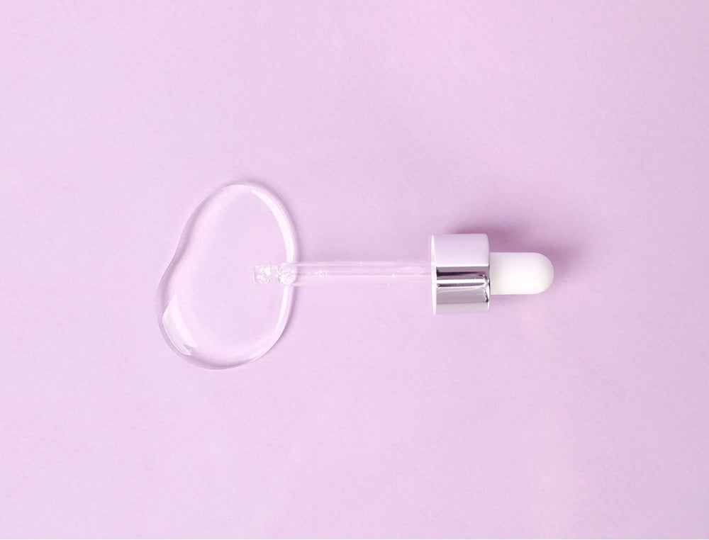 MIZON Collagen 100 ampoule dropper in use for easy hydration application