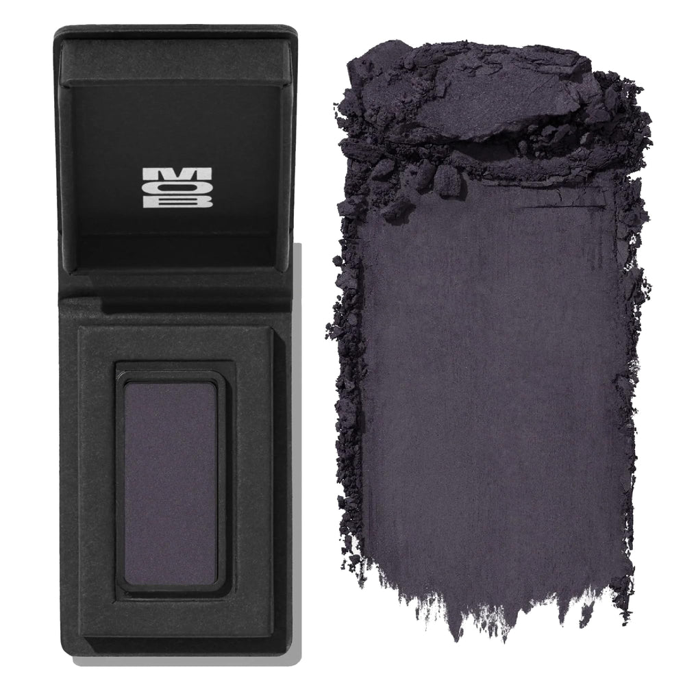 MOB Beauty Eyeshadow M14 pan swatch shows rich indigo-grey pigment for versatile looks.