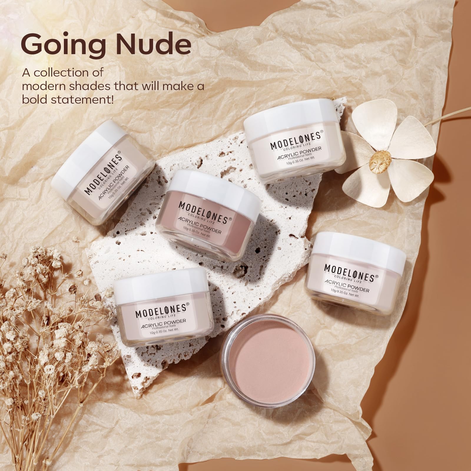 Modelones nude at-home manicure setup with color swatches.