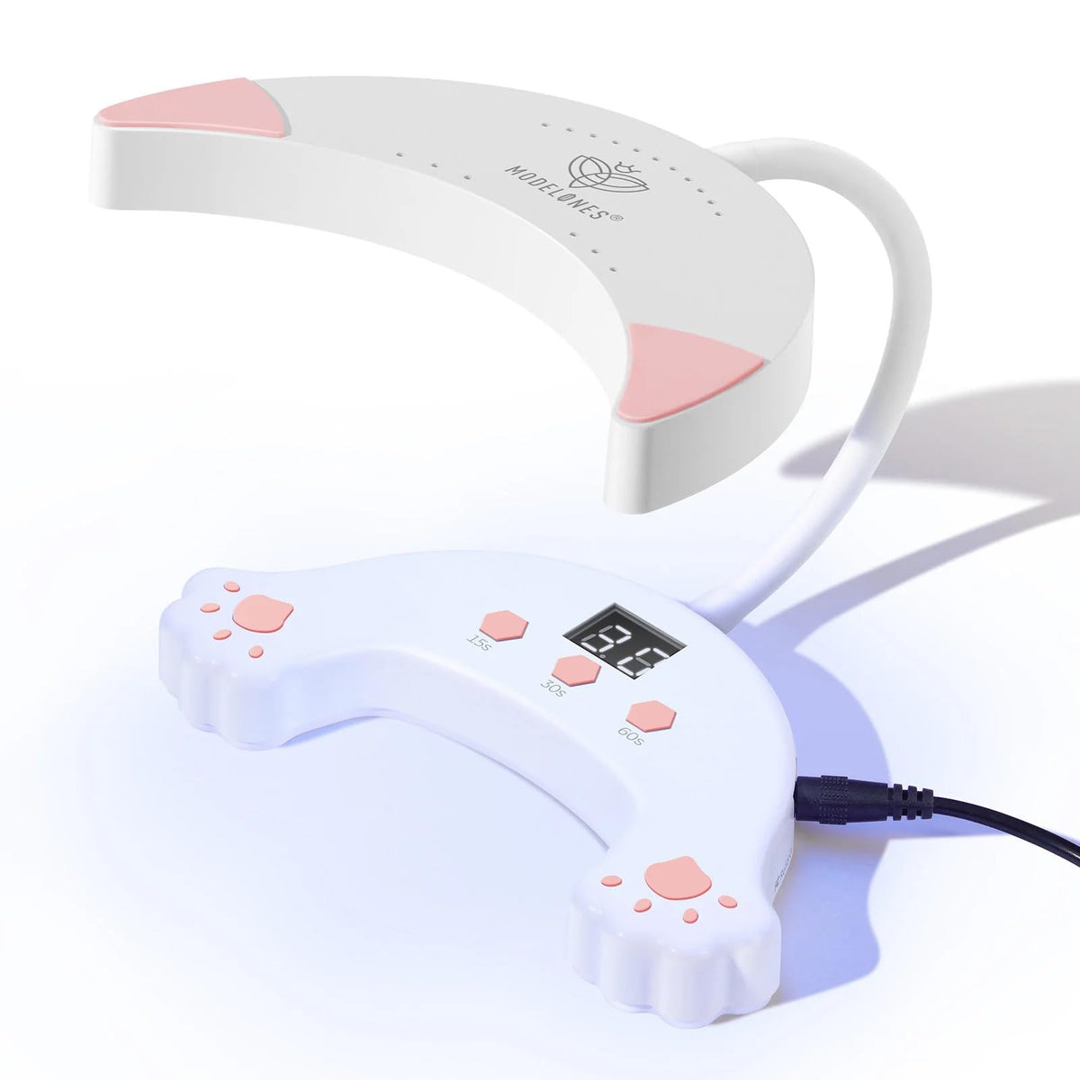 Modelones UV LED Nail Lamp on desk, compact home-use design for quick curing.