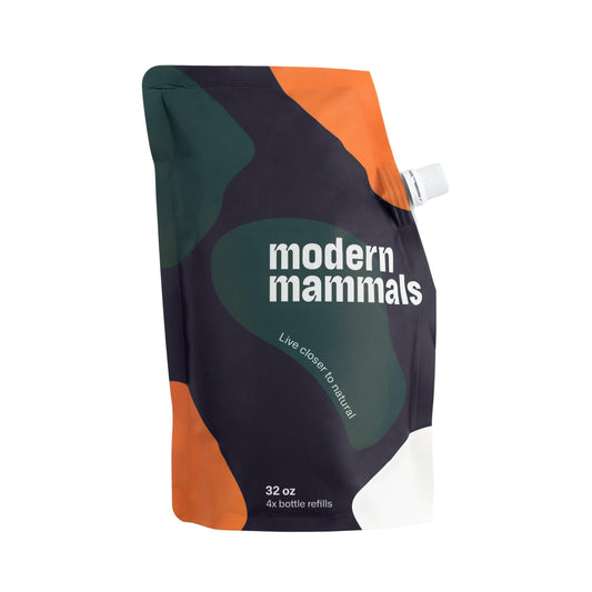 Modern Mammals shampoo alternative bottle pour shows gentle, balanced cleansing.