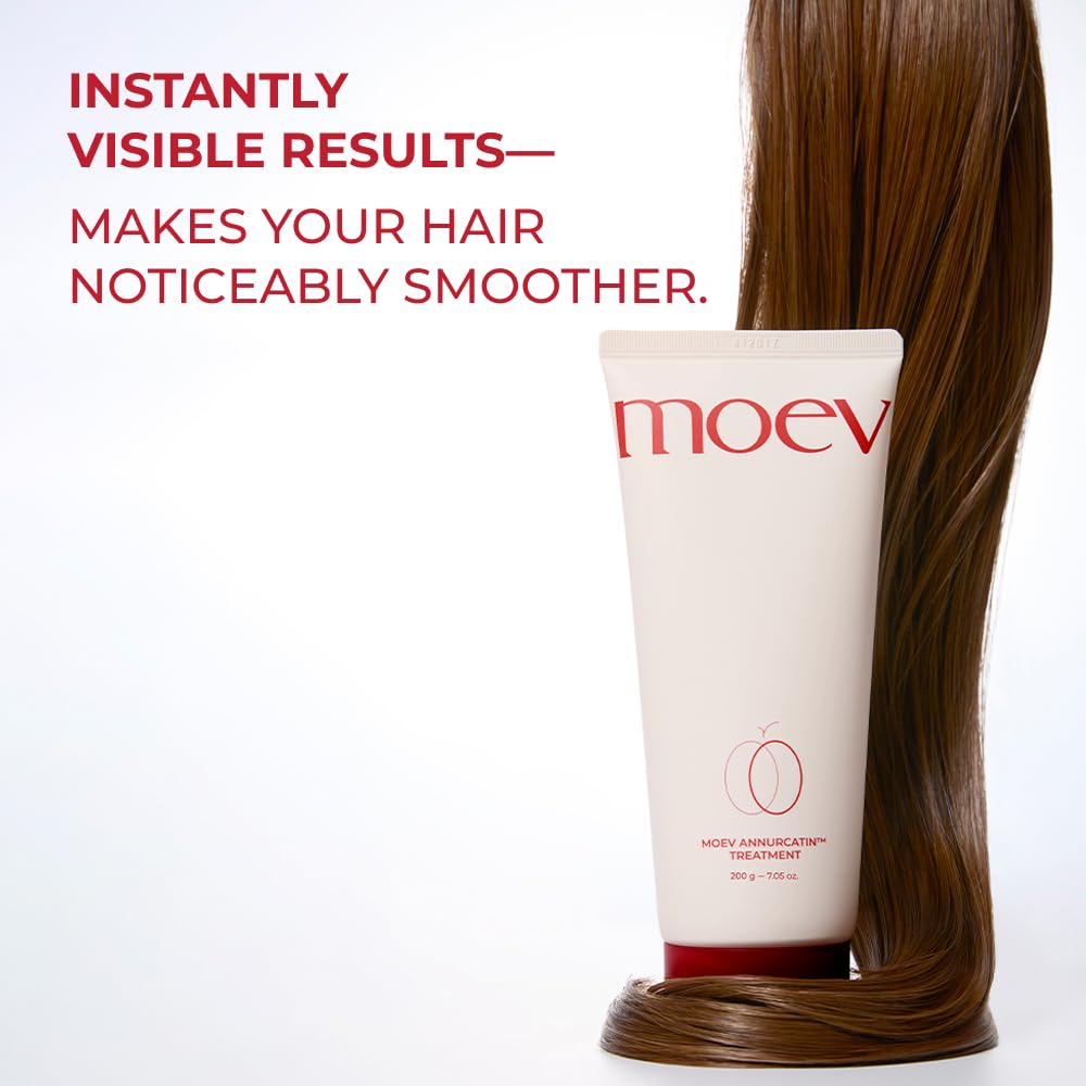 Applying MOEV Annurcatin Hair Mask to damp hair mid-lengths to ends